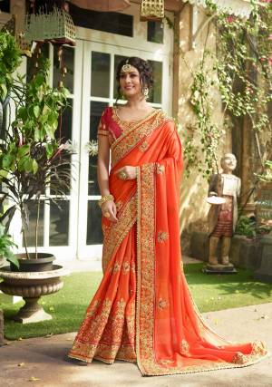 This Summer Look The Most Bright Of All Wearing This Saree In Orange Color Paired With Contrasting This Red Colored Blouse. This Saree And Blouse Are fabricated On Art Silk Heavy Embroidery. Buy This Bright Looking Saree Now.