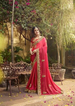 Attract All With This Pretty Saree In Dark Pink Color Paired With Contrasting Red Colored Blouse. This Saree And Blouse Are Fabricated On Art Silk Beautified With Heavy Embroidery. This Saree Is Easy To Drape And Carry All Day Long. Buy Now.