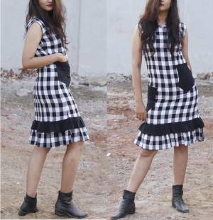For Your Semi-Casual Wear Or A Casual Date, Grab This Pretty Readymade Dress In Black And White Color Fabricated On Cotton Beautified With Checks Prints. It Is Light Weight And Easy To Carry All Day Long.