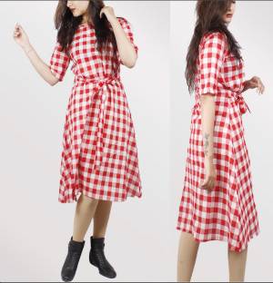 Grab This Checks Printed Readymade Dress In Red And White Color Fabricated On Cotton. It Is Available In Many Sizes And Also Ensures Superb Comfort All Day Long. Buy Now.