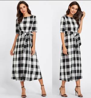 Grab This Checks Printed Readymade Dress In Black And White Color Fabricated On Cotton. It Is Available In Many Sizes And Also Ensures Superb Comfort All Day Long. Buy Now.
