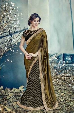 Sashay this vintage-style saree In Golden and Black Color with a conteporary soul at any of your night soiree and look like a diva . 