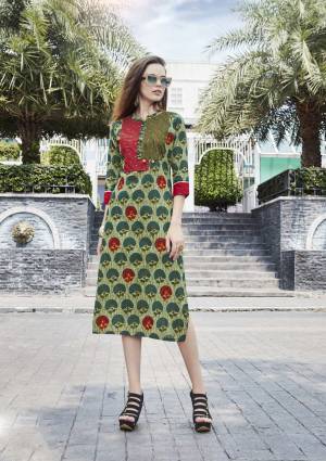 For Your Semi-Casual Wear, Grab This Pretty Kurti In Green Color Fabricated On Cotton Beautified With Prints And Thread Work. This Kurti Is Available In Many Sizes. Buy Now.