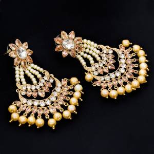Heavy Traditonal Earrings Are Here With This Beautiful Pair Of Earrings In Golden Color Can Be Paired With Any Traditional Attire In Any Color. Buy Now.