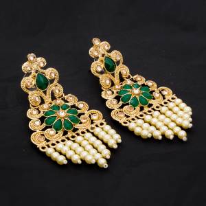 Enhance Your Look With This Lovely Pair Of Earring With Your Silk Saree. This Set Of Earrings In Light Weight And It Will Definitely Earn You Lots Of Compliments.