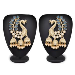Peacock Patterned Earring Set Is Here In Golden Color Beautified With Blue Colored Stones. This Earring Set Will Giva A Proper Traditonal Look To Your Personality. Buy This Unique Earrings Set Now.