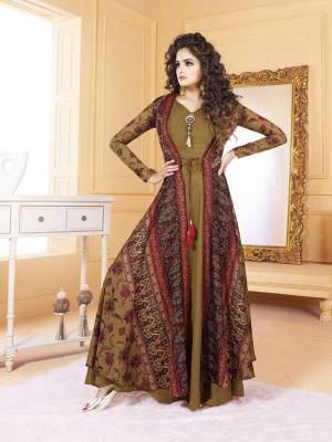 Get Ready For The Upcoming Festive Season With This Designer Readymade Gown In In Olive Green And Multi Color Fabricated On Tussar Art Silk Beautified with Digital Prints. Its Unique Jacket Pattern Will Earn You Lots Of Compliments From Onlookers.