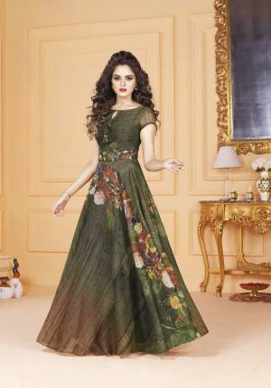 Look Beautiful Wearing This Designer Readymade Gown In Green Color Fabricated On Tussar Art Silk Beautified With Digital Prints All Over. This Readymade Gown Is Available In Many Sizes And Its Fabric Ensures Superb Comfort Throughout The Gala.