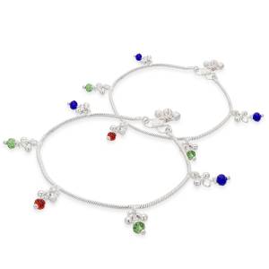 For A Traditional Touch, Grab This Anklet Set In Silver Color Beautified With Multi Colored Hangings. It Is Light Weight And You can Pair This Up With Any Traditonal Attire.