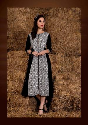 Enhnace Your Beauty Wearing This Designer Kurti In Black And White Color Fabricated On Rayon Cotton Beautified with Prints And Lovely Pattern. This Kurti Is Light Weight And Easy To Carry All Day Long.