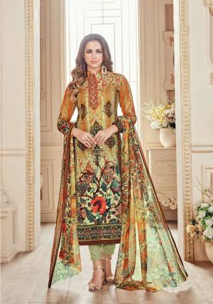 Go Colorful Wearing This Straight Cut Suit In Multi Colored Top Paired With Mint Green Colored Bottom And Multi Colored Dupatta. Its Top And Bottom Are Fabricated On Cotton Paired With Chiffon Dupatta. This Dress Material Is Light Weight And Easy To Carry All Day Long.