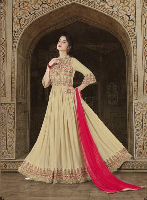 New And Unique Patterned Sleeve Is Here In This Designer Suit In Beige Colored Top Paired With Beige Colored Bottom And Pink Colored Dupatta. Its Top Is Fabricated On Satin Paired With Santoon Bottom And Chiffn Dupatta. Buy This Pretty Suit Now.