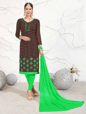 Here Is A Beautiful Combination In Dress Material In Brown Colored Top Paired With Contrasting Green Colored Bottom And Dupatta. Its Top Is Fabricated On Chanderi Cotton Paired With Cotton Bottom And Chiffon Dupatta. All Three Fabrics Ensures Superb Comfort All Day Long. Buy It Now.