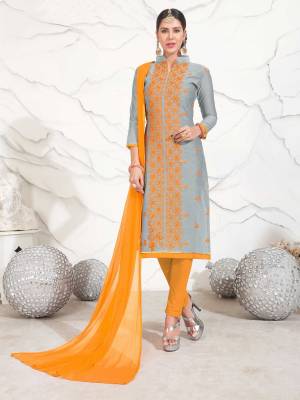 Elegant And Loevly Patterned Casual Suit Is Here With This Dress Material In Grey Colored Top Paired With Contrasting Musturd Yellow Colored Bottom And Dupatta. Its Top Is Fabricated On Chanderi Cotton Paired With Cotton Bottom And Chiffon Dupatta. All Three Fabrics Ensures Superb Comfort All Day Long.