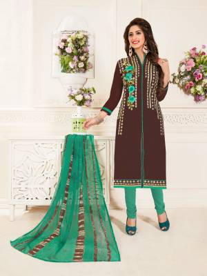 Add Some Beautiful Semi-Casual Suit To Your Wardrobe In Brown Color Paired With Green Colored Bottom And Dupatta. Its Top Are Fabricated in Chanderi Cotton And Bottom Are Fabricated On Cotton Paired With Chiffon Dupatta. This Suit Is Soft Towards Skin And Easy To Carry All Day Long.