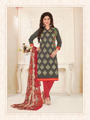 Flaunt Your Bold Side With This Grey Colored Suit Paired With Red  Colored Bottom And Red And Beige Colred Dupatta. Its Top Are Fabricated On Chanderi Cotton And Bottom Are Fabricated On Cotton  Paired With Chiffon Dupatta. This Dress Material Is Soft Towards Skin And Easy To Carry All Day Long. Buy Now.