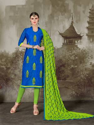 Celebrate This  Season With Easy And Comfort In Comfortable Attire. Grab This  Blue Colored Dress Material  Paired With Contratsing Green Colored Bottom And Dupatta. Its Top Is Fabricated On Chanderi Cotton Paired With Cotton Bottom And Nazneen Dupatta.Which Is Soft Towards Skin And Comfortable To Carry All Day Long. Buy It Now.