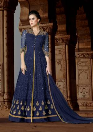 Celebrate This Festive Season With This Lovely Designer Floor Length Suit In Blue Color Paired With Golden Colored Lehenga And Blue Colored Dupatta. Its Top Is Fabricated On Net Paired With Art silk Lehenga And Net Dupatta. It Top Has Heavy Embroidery All Over It. Buy This Soon Before The Stock Ends.