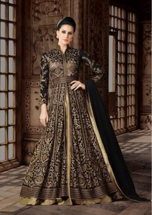 Bright And Visually Appealing Indo-Western Suit Is Here In Black Color Paired With Golden Colored Lehenga And Black Colored Dupatta. Its Top Is fabricated On Net Paired With Art Silk Lehenga And Net Dupatta. This Floor Length Suit Is Suitable For All Occasion. Buy This Now.