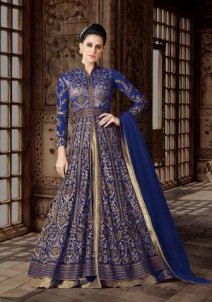 Bright And Visually Appealing Indo-Western Suit Is Here In Blue Color Paired With Golden Colored Lehenga And Blue Colored Dupatta. Its Top Is fabricated On Net Paired With Art Silk Lehenga And Net Dupatta. This Floor Length Suit Is Suitable For All Occasion. Buy This Now.