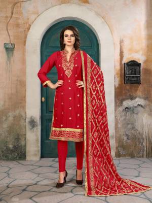 Adorn The Angelic Look Wearing This Designer Suit In Red Color Paired With Red Colored Bottom And Dupatta. Its Top Is Fabricated On Georgette Paired With Santoon Bottom And Chiffon Dupatta. It Has Heavy Jari Embroidery Over Its Top And Dupatta. Buy This Suit Now.