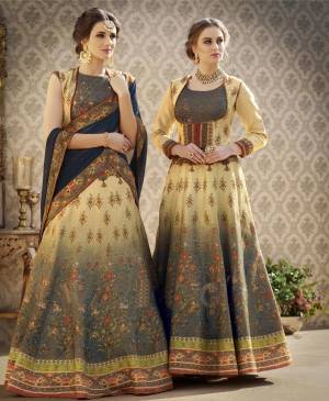 Here Is A Designer Lehenga Choli In Cream Colored Blouse Paired With Cream And Multi Colored Lehenga And Contrasting Blue Colored Dupatta. Its Blouse And Lehenga Are Fabricated On Banarasi Art Silk Beautified With Digital Prints And Stone Work. It Is Light Weight And easy To Carry Throughout The Gala.