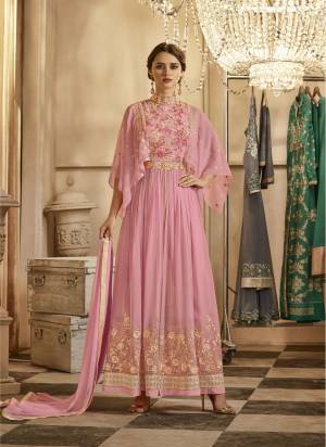 Look Pretty In This Designer Suit In Lovely Pink Colored Top Paired With Pink Colored Bottom And Dupatta. Its Top Is Fabricated On Georgette Paired With Santoon Bottom And Chiffon Dupatta. Its Top Has A New Attractive Sleeve Pattern And Detailed Embroidery All Over The Top.