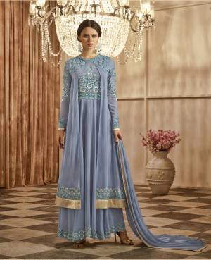 Celebrate This Festive Season Wearing This Designer Suit In Light Blue Color Paired With Light Blue Colored Bottom And Dupatta. Its Top Is Fabricated On Georgette Paired With Santoon Bottom And Chiffon Dupatta. It Is Also Light Weight And Easy To Carry Throughout The Gala.