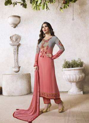 Shades Are In This Season, So Grab This Shaded Semi-Stitched Suit In Pink And Grey Color Paired With Pink Colored Bottom And Dupatta. Its Top Is Fabricated On Georgette Paired With Santoon Bottom And Chiffon Dupatta. It Is Beautified With Contrasting Embroidery All Over.