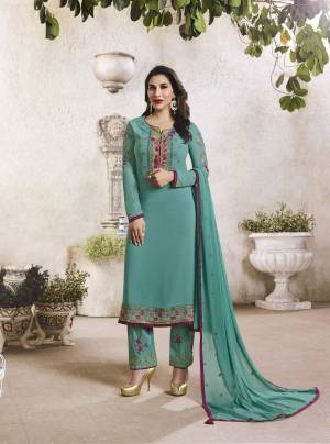 Add This New Shade In Blue To Your Wardrobe With This Semi-Stitched Suit In Teal Blue Color Top Paired With Teal Blue Colored Bottom And Dupatta. Its Top Is Fabricated On Georgette Paired With Santoon Bottom And Chiffon Dupatta. It Is Light Weight And Esnures Superb Comfort All Day Long.