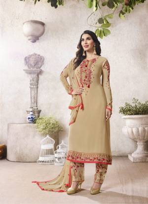Flanut Your Rich And Elegant Taste, Wering This Designer Straight Cut Suit In Beige Colored Top Paired With Beige Colored Bottom And Dupatta. Its Top Is Fabricated On Georgette Paired With Santoon Bottom And Chiffon Dupatta. It Has Contrasting Red Colored Embroidery .