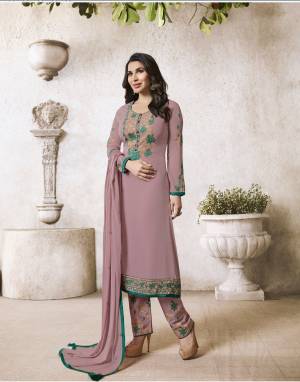 Here Is A Beautiful Shade In Purple With This Designer Straight Cut Suit In Mauve Color Paired With Mauve Colored Bottom And Dupatta. Its Top Is Fabricated On Georgette Paired With Santoon Bottom And Chiffon Dupatta. Its All Three Fabrics Ensures Superb Comfort All Day Long. 