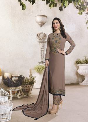 Such A Beautiful And Uncommon Shade Is Here In Light Brown Colored Designer Straight Cut Suit Paired With Light Brown Colored Bottom And Dupatta. Its Top Is Fabricated On Georgette Paired With Santoon Bottom And Chiffon Dupatta. This Suit Is Durable And Easy To Care For.