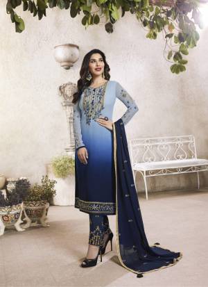 Go With The Shades Of Blue Wearing this Straight Cut Suit In Light Blue And Navy Blue Colored Top Paired With Navy Blue Colored Bottom And Dupatta. Its Top Is Fabricated On Georgette Paired With Santoon Bottom And Chiffon Dupatta. Buy This Lovely Designer Suit Now.