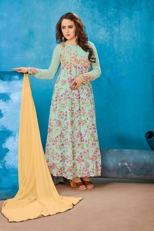 This Season Is About Subtle Shades And Pastel Play, So Grab This Designer Suit In Pastel Green Colored Top Paired With Pastel Green Colored Bottom And Cream Colored Dupatta. This Suit Is Light Weight, Durable And Easy To Care For.