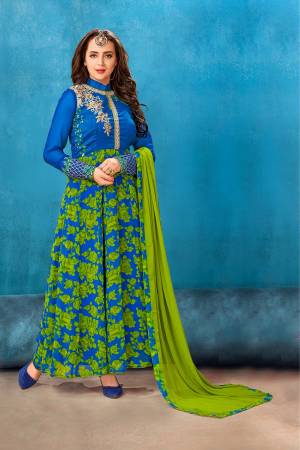 Colors Add Beauty To Any Thing And Ever Thing, So Grab This Beautiful Suit In Blue And Green Color Paired With Blue Colored Bottom And Green Colored Dupatta. Its Top Is Fabricated On Georgette Paired With Santoon Bottom And Chiffon Dupatta. Buy This Suit Now.