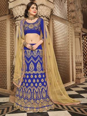 Bright And Visually Appealing Color Is Here With This Designer Lehenga Choli In Royal Blue Color Paired With Beige Colored Blouse. This Lehenga And Choli Are Fabricated On Art Silk Paired With Net Fabricated Dupatta. Buy This Pretty Lehenga Choli Now.