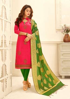 If Those Readymade Suit Does Not Lend You The Desired Comfort, Than Grab This Dress Material In Pink Colored Top Paired With Contrasting Green Colored Bottom And Dupatta. Its Top Is Fabricated On Glace Cotton Paired With Cotton Bottom And Banarasi Art Sil Dupatta. Get This Stitched As Per Your Desired Fit And Comfort.