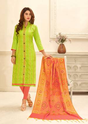 A Very Pretty Combination Is Here With This Dress Material In Light Green Color Paired With Contrasting Peach Colored Bottom And Dupatta. Its Top Is Fabricated On Glace Cotton Paired With Cotton Bottom And Banarasi Art Silk Dupatta. It Is Beautified With Thread Work.