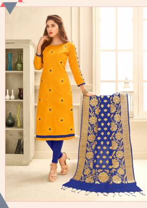 Bright And Visually Appealing Shades Are Here With This Dress Material In Yellow Colored Top Paired With Contrasting Royal Blue Colored Bottom And Dupatta. Its Top Is Fabricated On Glace Cotton Paired With Cotton Bottom And Banarasi Art Silk Dupatta. Its All Three Fabrics Ensures Superb Comfort All Day Long.