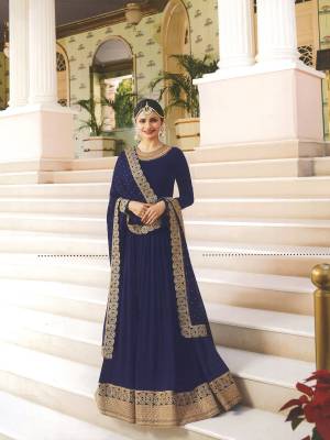 Enhance Your Personality Wearing This Rich And Royal Looking Designer Floor Length Suit In Navy Blue Colored Top Paired With Navy Blue Colored Bottom And Dupatta. Its Top Is Fabricated On Art Silk Paired With Santoon Bottom And Chiffon Dupatta. This Heavy Designer Suit Will Earn You Lots Of Compliments From Onlookers. Buy Now.