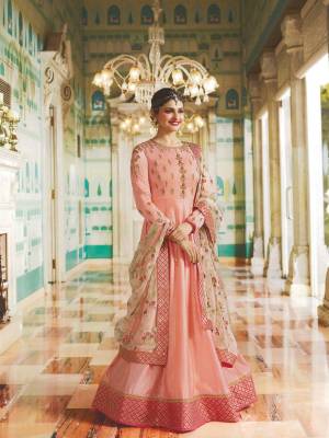 Look Pretty In This Designer Floor Length Suit In Pink Color Paired With Pink Colored Blouse. Its Top Is Fabricated On Art Silk Paired With Santoon Bottom And Net Fabricated Dupatta. Its Yoke And Sleeves Are Beautified With Embroidery With A Very Beautiful Designer Heavy Embroidered Dupatta. Buy This Suit Now.