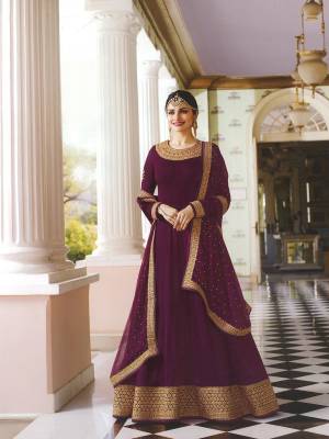 Your Will Deffinitely Earn Lots Of Compliments Wearing This Designer Floor Length Suit In Attractive Wine Colored Top Paired With Wine Colored Bottom And Dupatta. Its Top Is Fabricated On Georgette Paired With Santoon Bottom And Chiffon Dupatta. Its Fabrics Ensures Superb Comfort Throughout The Gala.