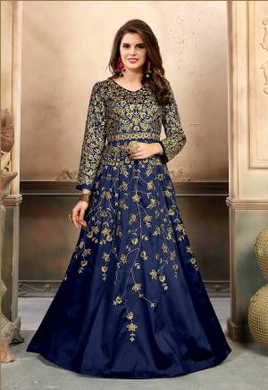 Enhance Your Personality Wearing This Deisgner Floor Length Suit In Blue Color Paired With Blue Colored Bottom And Dupatta. Its Top Is Fabricated On Art Silk Paired With Santoon Bottom And Net Dupatta. It Is Light Weight And Easy To Carry Throughout The Gala.