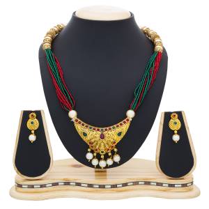 Make Your Simple Attire Look More Heavy Pairing It Up With This Beautiful Necklace Set In Golden Color.