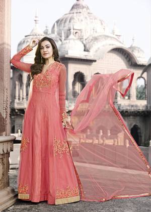 A Pretty Looking Shade Is Here In Pink With This Designer Floor Length Suit In Old Rose Pink Color Paired With Old Rose Pink Colored Bottom And Dupatta. Its Top Is Fabriacted On Net Paired With Santoon Bottom And Net Dupatta. It Is Light Weight And Easy To Carry Throughout The Gala.
