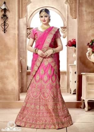 Girl Who Choose Pink Over Red Is Definitely A Doll, So Dolled Up With This Beautiful Designer Lehenga Choli In Pink Color Paired With Pink Colored Dupatta And Another Dupatta Is In Contrasting Light Green Color. Its Blouse Is Fabricated On Art Silk Paired With Nylon Satin Lehenga And Net Fabricated Dupatta. Buy Now.