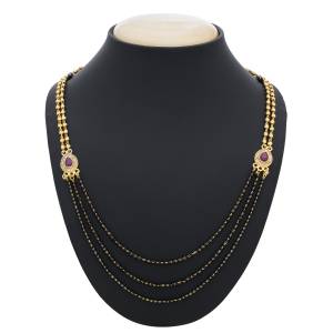 Here Is A Lovely Designer Mangalsutra With Multiple Layred Chains Of Black Moti. This Is For Some Occasion Wear And It Will Definitely Earn You Lots Of Compliments From Onlookers.