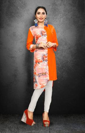 Summer Is About Bright Shades And Attractive Colors, So Grab This Readymade Kurti In Orange Color Fabricated On Rayon Beautified With Prints. Buy This Simpe Kurti Now.