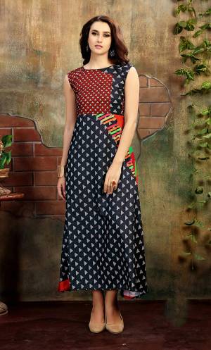 Add This Readymade Kurti To Your Wardrobe In Black And Multi Color Beautified With Prints All Over It. This Readymade Kurti Is Light Weight And easy To carry All Day Long.